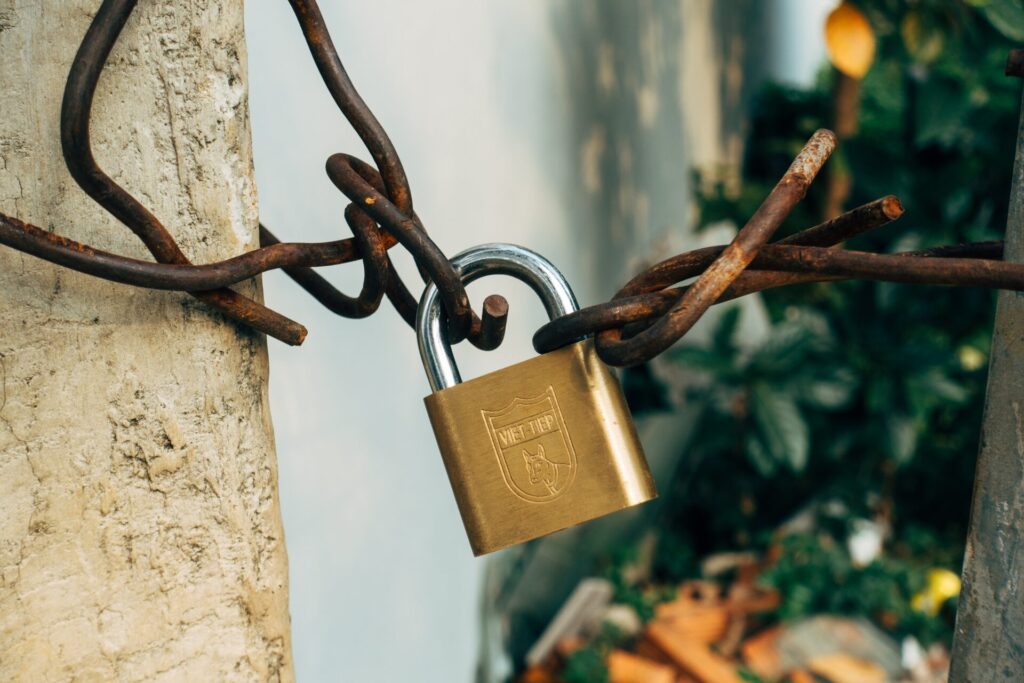A lock connecting the chains. Representation of security